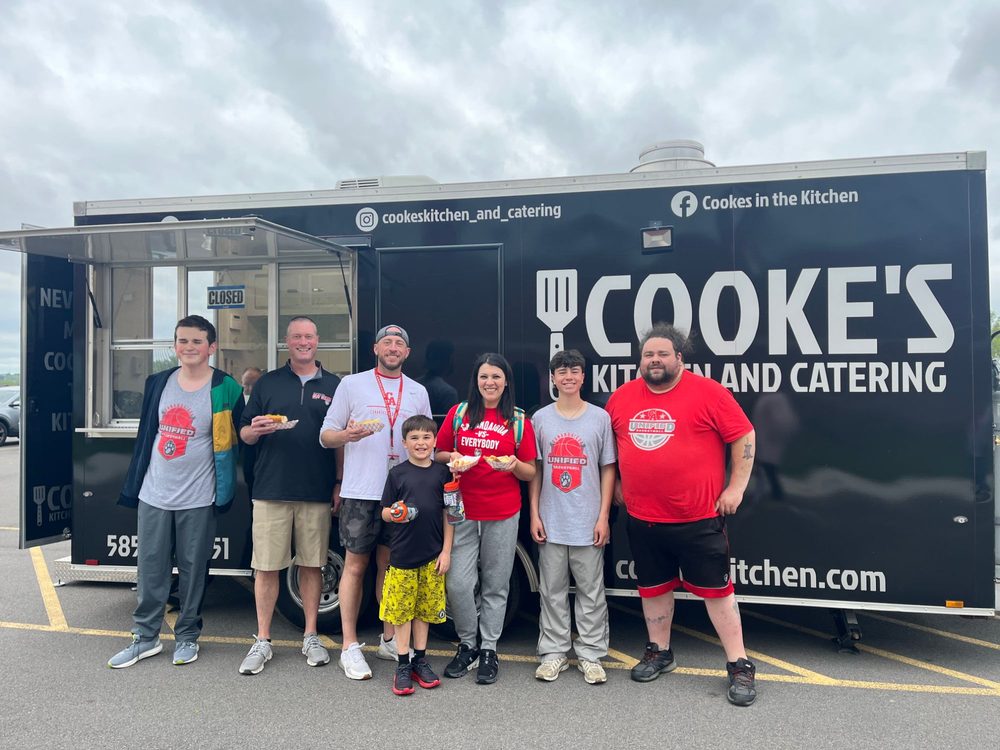 Cooke's Kitchen and Catering food truck with the Canandaigua Unified Basketball team