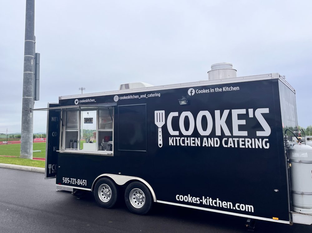 Cooke's Kitchen and Catering food truck with service window open at the Mental Health Awareness Walk
